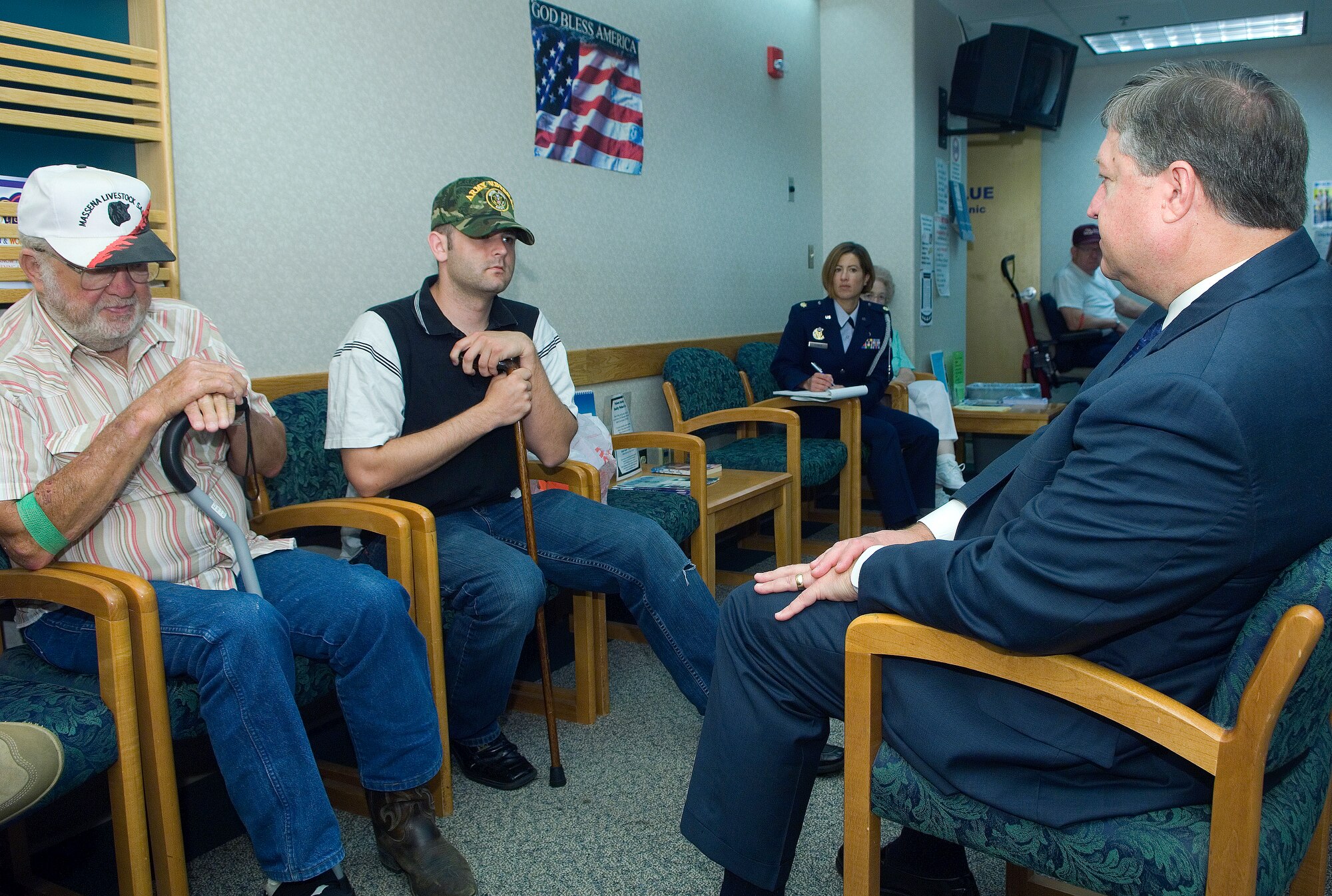 Acting Secretary of the Air Force Michael B. Donley speaks with Air Force veteran Thomas Riley (left) and Army National Guard veteran Sgt. Jamie Ruddick (right) about their time in service during an Aug. 11 tour of the VA Medical Center in Omaha, Neb. Secretary Donley visited with veterans living in the Omaha area during his visit as part of Air Force Week in the Heartland. (U.S. Air Force photo/Staff Sgt. Bennie J. Davis III)