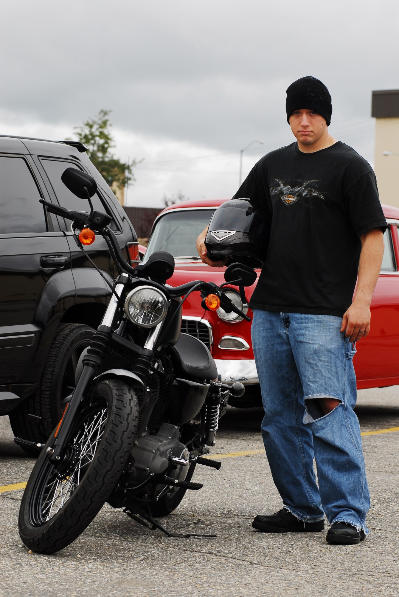 Staff Sgt. Luke Thornton, 354th Communications Squadron, stands next to his Nightster Harley-Davidson which one 1st Place in the motorcycle category during the second Iceman Car and Motorcycle Show sponsored by 354th Force Support Squadron Aug. 9, 2008, at Eielson Air Force Base, Alaska. Prizes were awarded for best motorcycle, best truck, best current model vehicle and people's choice. (U.S. Air Force photo by Airman 1st Class Jonathan Snyder)