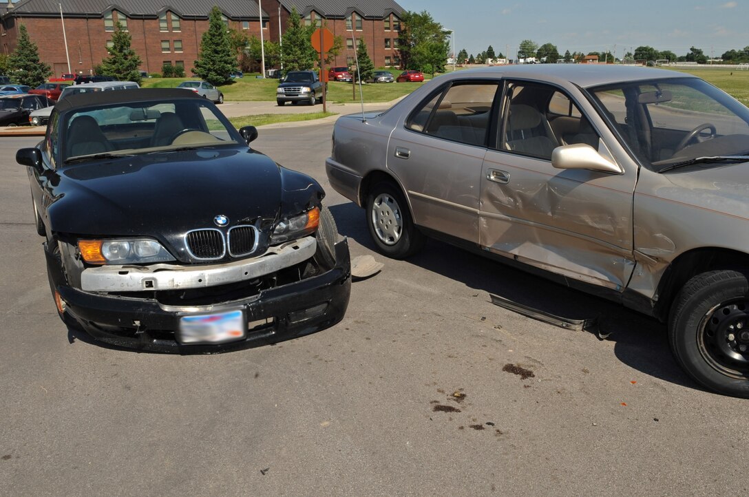 Members of the 28th Security Forces Squadron responded to a vehicular accident at the intersection of Spaatz Drive and Schriever Street here, Aug. 7. The 28th Bomb Wing Safety Office reminds Ellsworth drivers to be cautious of distractions while driving in order to prevent occurrences such as this in the future. The accident is currently under investigation. (U.S. Air Force photo by/Airman Corey Hook)