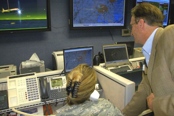 Larry Christie a leader of the Tyndall distributed mission team shows airmen how the virtual technology works to provide leaders information make critical decisions,  