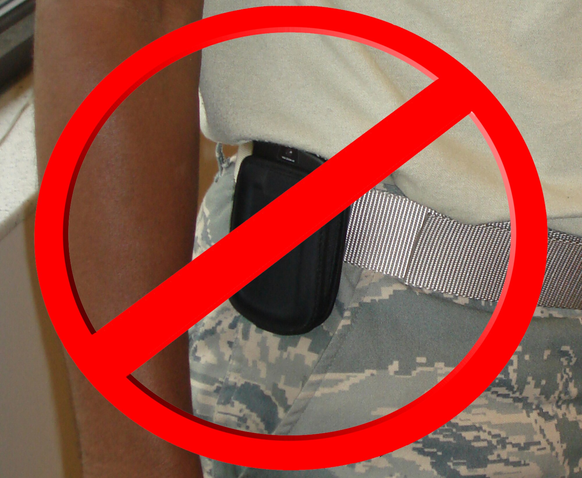 Members are remindered that all devices, to include pagers, cellular phones and personal digital assistants, must conform to the following Air Force Instruction 36-2903 guidelines: All devices must be solid in color or covered in black, silver, dark blue, or gray, and must be conservative. Device may be clipped to the left side of the waistband or purse or carried in left hand. Only one device may be worn on the uniform belt. Members will not walk in uniform while using cell phones, radios, or hands-free headsets unless required in the performance of official duties using a government issued device. This information is filed under Table 2.6, Item 10. (U.S. Air Force photo illustration/Senior Airman Stephen Collier)