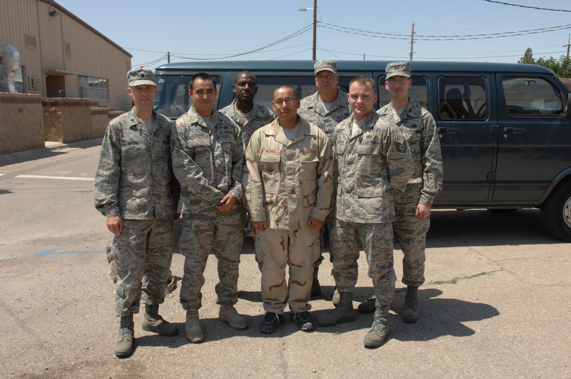 49th Mission Support Group Commander, Col. Stephen DiFonzo, 49th Civil Engineer Squadron Commander, Lt Col. Michael Myers and 49th CES Superintendent, Chief Master Sgt. John.Gibson II, welcome home four 49th CES Airmen after their return from a four month deployment Aug. 6. (U.S. Air Force photo/Senior Airman Anthony Nelson Jr)