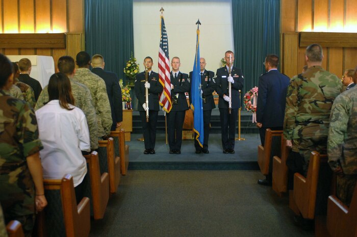 Members of the 99th Civil Engineer Squadron present the Colors at  Sandra Kracke's Memorial Service, held at the Base Chapel on Nellis Air Force Base, Nev., Aug. 8, 2008. Mrs. Kracke, 99th CES security manager, died in a vehicle accident Aug. 5.
(U.S. Air Force photo / Senior Airman Jason R. Huddleston)