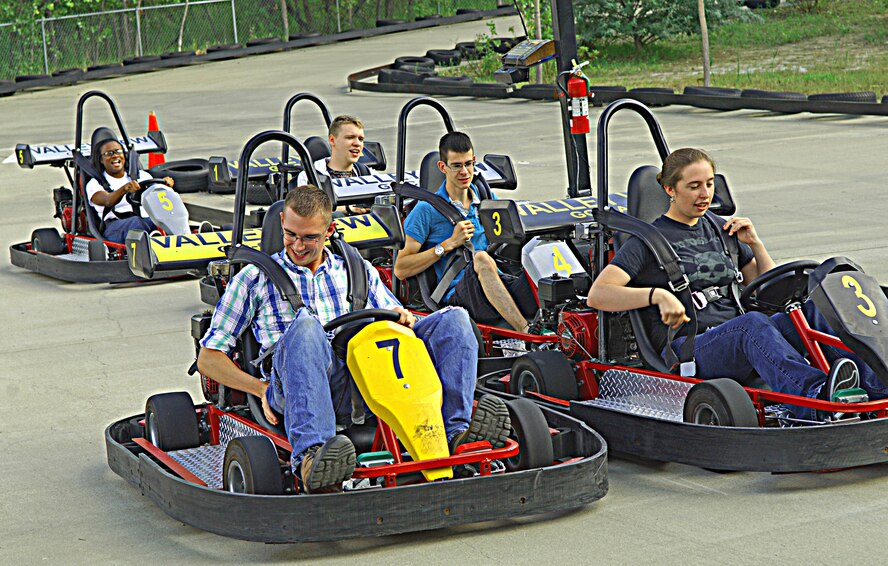 MINOT, N.D. -- Minot Airmen prepare for a go-kart race at Valleyview Falls Mini-Golf-Go Aug. 9. Every weekend a group of Warbirds and Rough Riders find activities in and around Minot to keep themselves entertained. (Courtesy photo)