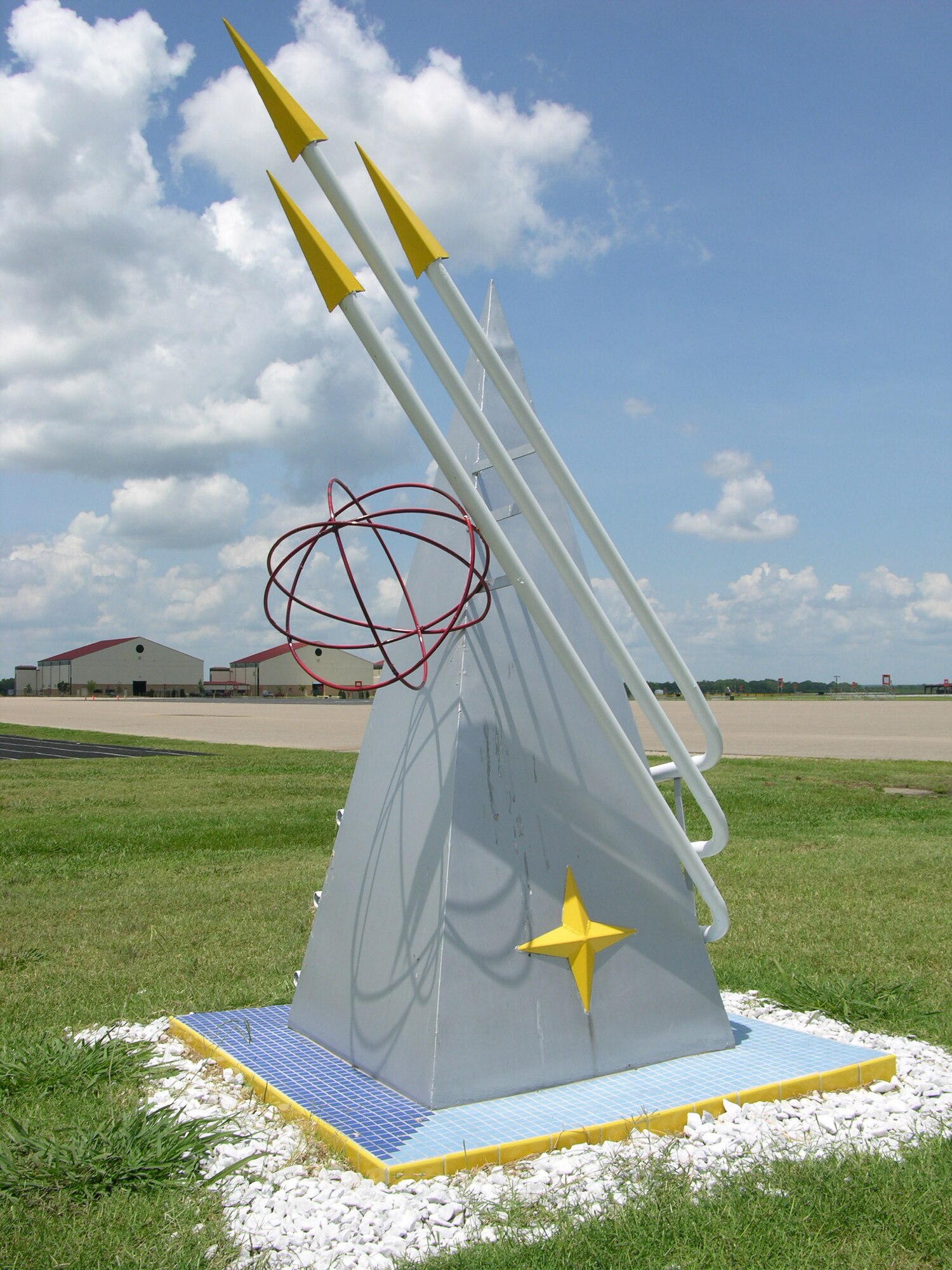 The 3-D representation of the Officer Training School patch was originally located on the OTS complex at Lackland Air Force Base, Texas. Today, it stands just west of the OTS parade field and is referred to by OTS students and personnel as the school?s mascot. It was trucked to Maxwell in 1993 and installed at the old OTS dormitories before they were demolished. The patch was then moved to the OTS complex until it was stored near the Project-X site. It was discovered there last year, and officer trainees restored the patch as a class project.  (Air Force photo by Carl Bergquist)