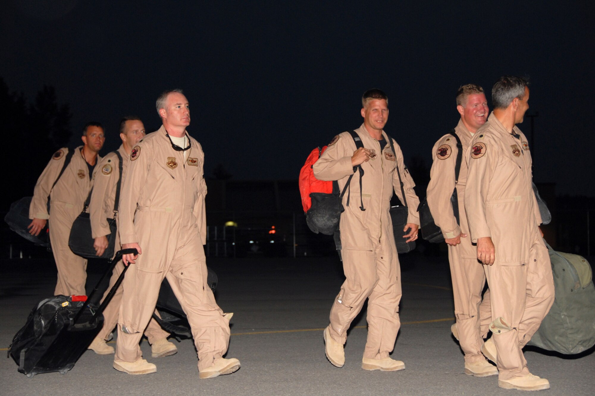 Pilots with the 174th Fighter Wing at Hancock Field, N.Y., return home Aug. 5 from their final combat deployment in support of Operation Iraqi Freedom.  The unit dispatched 14 F-16 Fighting Falcons to Iraq on June 10.  This was the last deployment for the unit using the F-16s. They will begin transitioning to the MQ-9 Reaper this fall. (U.S. Air Force photo/Tech. Sgt. Jeremy M. Call)