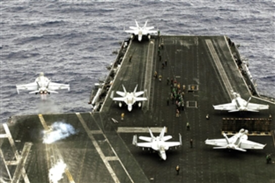 An F/A-18F Super Hornet assigned to Strike Fighter Squadron 102 launches from the aircraft carrier USS Kitty Hawk for the last time in Pacific Ocean, Aug 6, 2008. Carrier Air Wing 5 aircraft flew off Kitty Hawk to join the nuclear-powered aircraft carrier USS George Washington in San Diego. In September, George Washington will replace Kitty Hawk as the Navy's only carrier operating from Japan.  