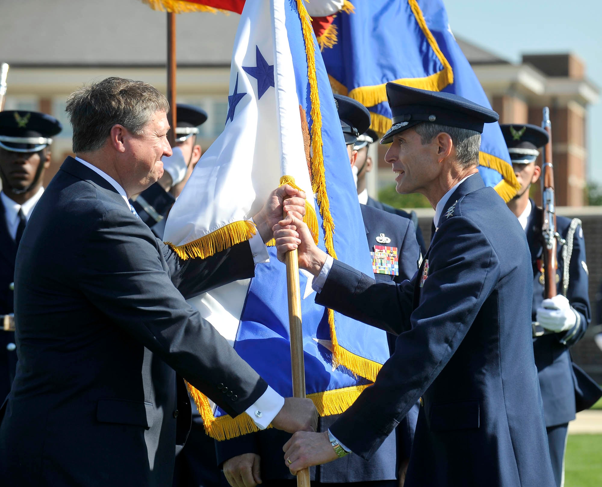 Gen. Norton A. Schwartz accepts the Air Force flag from Acting Secretary of the Air Force Michael B. Donley Aug. 12 during a welcoming ceremony at Bolling Air Force Base D.C., in honor of General Schwartz.  The general is the 19th Air Force chief of staff.  (U.S. Air Force photo/Scott M. Ash) 