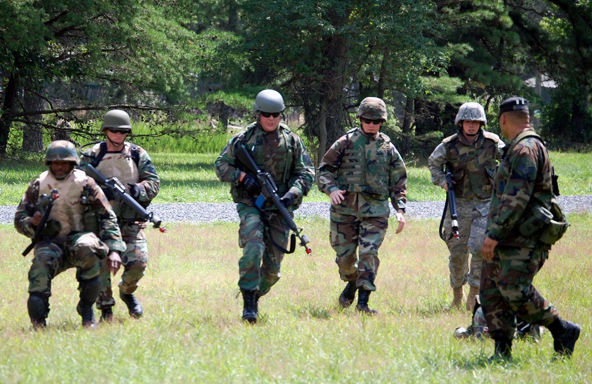 Students in the Advanced Contingency Skills Training Course participate in patrolling and tactics training for the course Aug. 12, 2008, on a range on Fort Dix, N.J.  The course, taught by the U.S. Air Force Expeditionary Center's 421st Combat Training Squadron, prepares Airmen from multiple career fields for upcoming deployments.  (U.S. Air Force Photo/Tech. Sgt. Scott T. Sturkol)