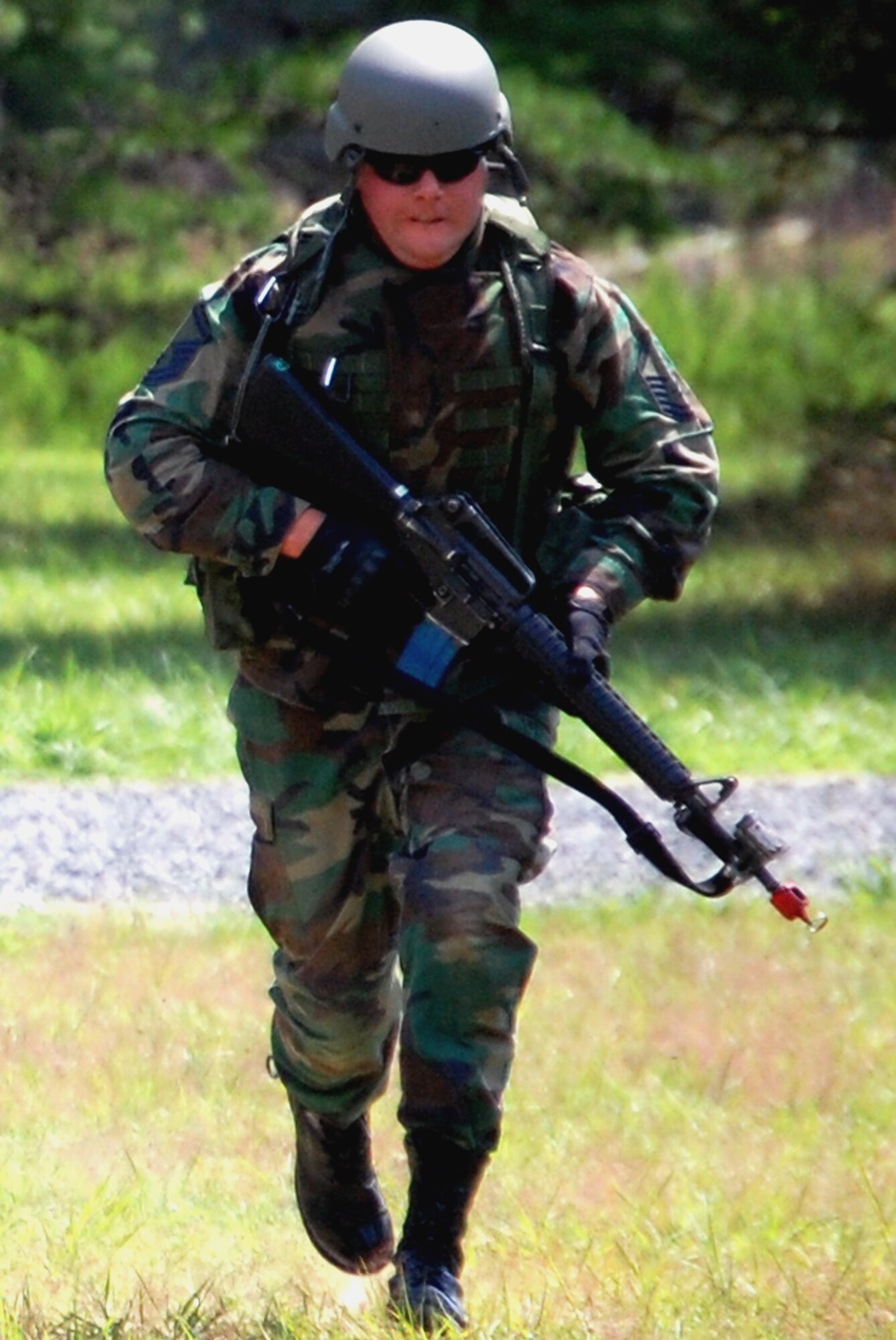 A student in the Advanced Contingency Skills Training Course participates in patrolling and tactics training for the course Aug. 12, 2008, on a range on Fort Dix, N.J.  The course, taught by the U.S. Air Force Expeditionary Center's 421st Combat Training Squadron, prepares Airmen from multiple career fields for upcoming deployments.  (U.S. Air Force Photo/Tech. Sgt. Scott T. Sturkol)
