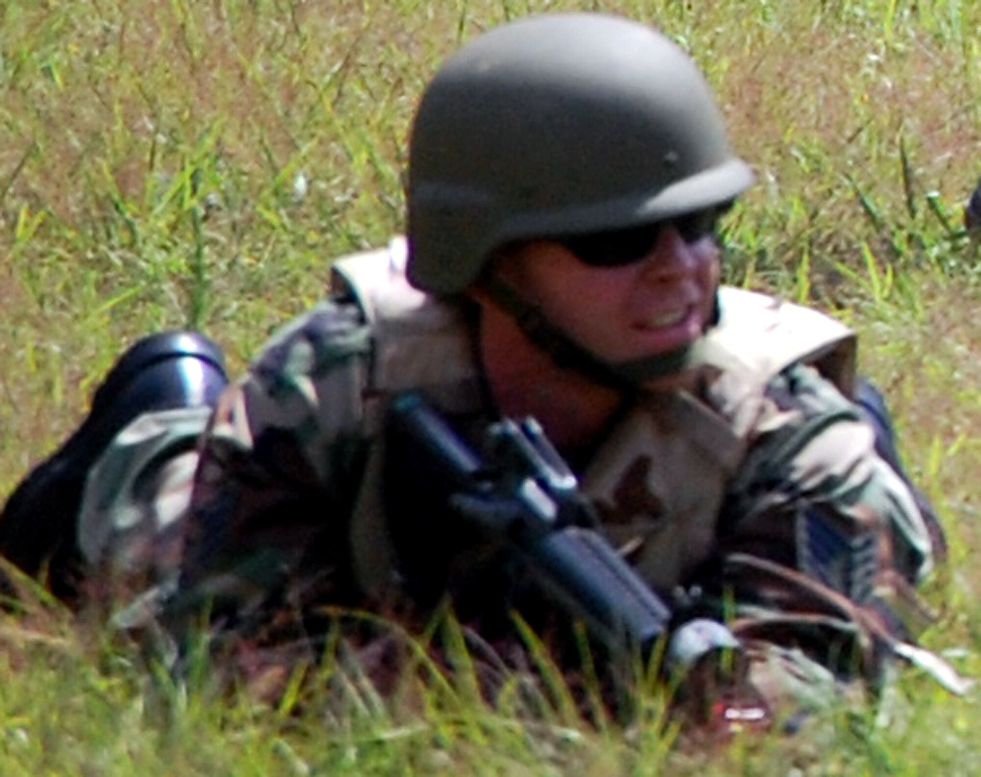 A student in the Advanced Contingency Skills Training Course participates in patrolling and tactics training for the course Aug. 12, 2008, on a range on Fort Dix, N.J.  The course, taught by the U.S. Air Force Expeditionary Center's 421st Combat Training Squadron, prepares Airmen from multiple career fields for upcoming deployments.  (U.S. Air Force Photo/Tech. Sgt. Scott T. Sturkol)