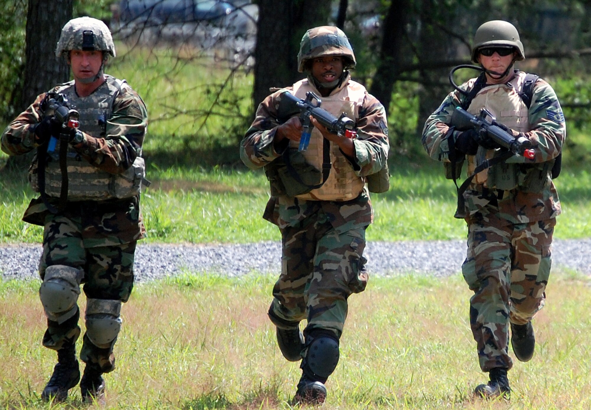 Students in the Advanced Contingency Skills Training Course participate in patrolling and tactics training for the course Aug. 12, 2008, on a range on Fort Dix, N.J.  The course, taught by the U.S. Air Force Expeditionary Center's 421st Combat Training Squadron, prepares Airmen from multiple career fields for upcoming deployments.  (U.S. Air Force Photo/Tech. Sgt. Scott T. Sturkol)