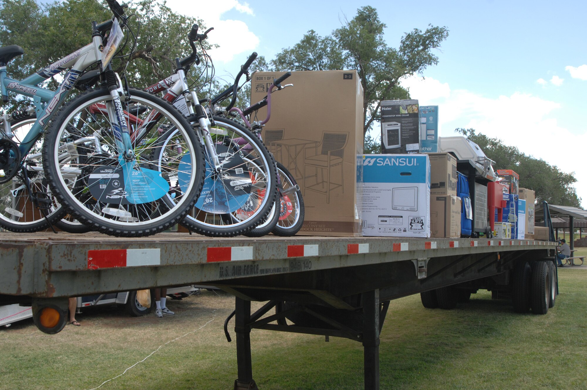 CANNON AIR FORCE BASE, N.M. -- A flatbed trailer was necessary to display the prizes won by Airmen, family members and civilian workers on the base. Nearly $5,000 in prizes were donated by Clovis, N.M. businesses for the 19th annual Cannon Appreciation Day Aug. 8. (U.S. Air Force photo by Greg Allen)