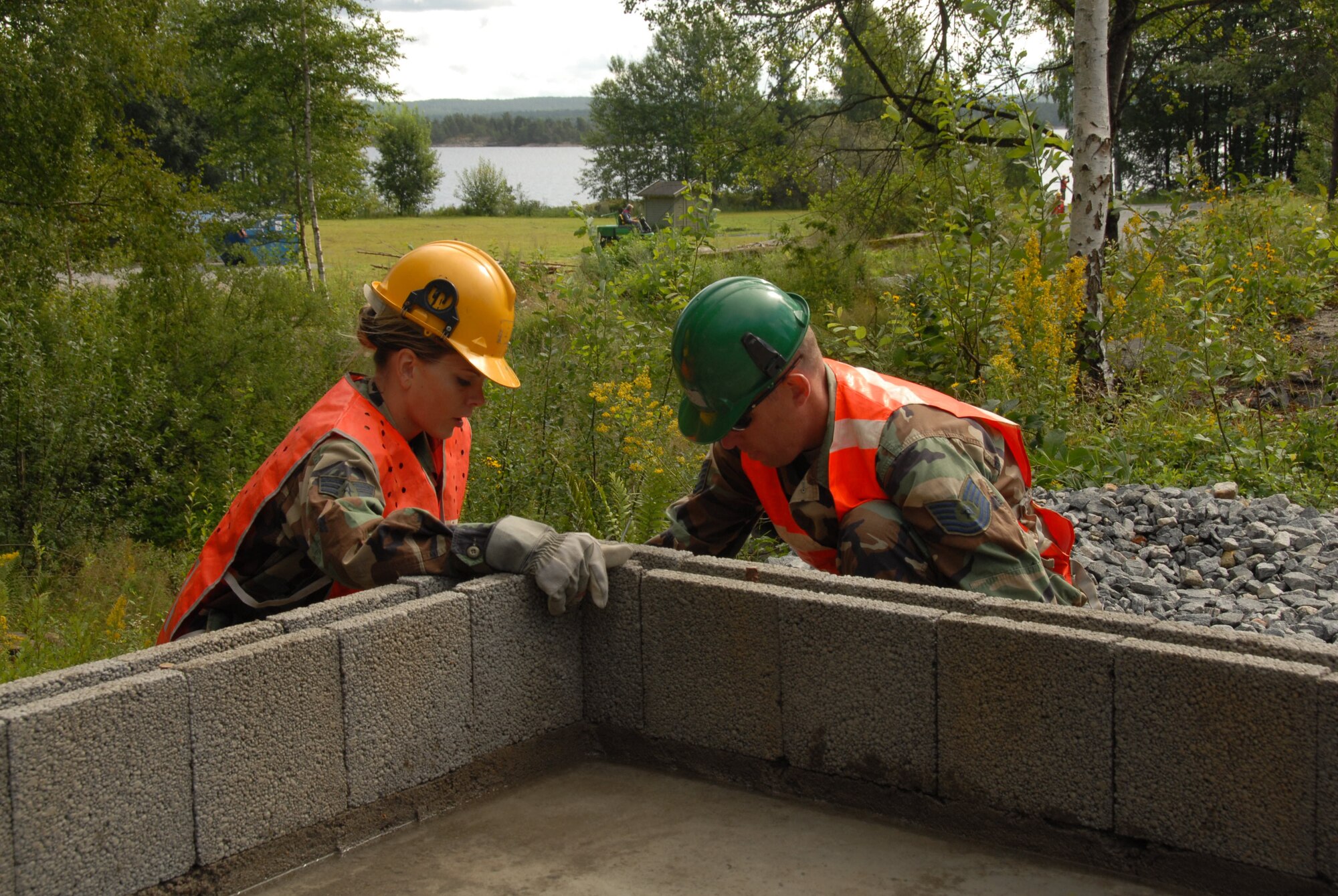 August 11, 2008 Rygge, Air Force Base, Norway-

SrA Abby Drefke and TSgt. Jeffrey Styles prepare the foundation of a new garage wall that will be part of the military dog training compound.  Members of the Iowa Air National Guard, 185th Air Refueling Wing (ARW), Civil Engineering (CE) in Sioux City, Iowa, deployed for training to Rygge Air Force Base, Norway, in support of Operation Impeccable Glove 2008. The engineering joint training mission is a humanitarian mission with the Norwegian Air force and Army Cadets, from the Norwegian Military Academy. 

Official Air Force Photo By: SSgt. Oscar M. Sanchez-Alvarez
