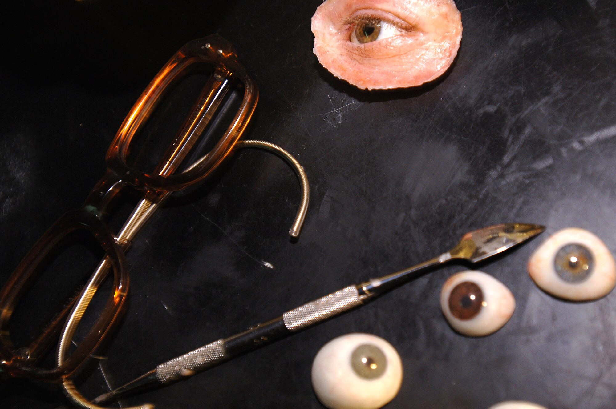 Senior Airman Justin Jones creates prosthetic eyes and other facial features. Airman Jones is a maxillofacial prosthetic technician assigned to the 59th Dental Squadron at Lackland Air Force Base, Texas. (U.S. Air Force photo/Staff Sgt. Erin Peterson) 
