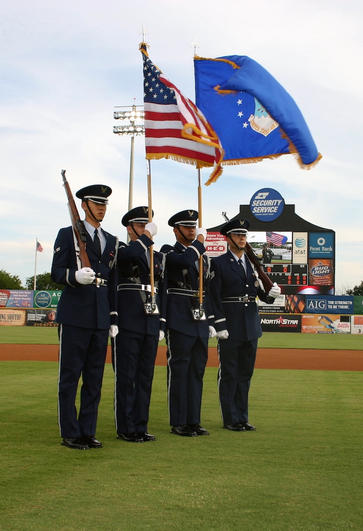 The Randolph Air Force Base honor guard presents the colors at a San Antonio Mission's baseball game Aug. 6. Capt. Deric Prescott sang the national anthem, the honor guad presented the colors and Senior Airman James Heathcoat threw the first pitch. The Missions gave military members and their family members up to ten ticket vouchers through the base Information, Tickets and Travel office. Another military appreciation night is Aug. 20 and tickets are available from ITT in Bldg. 897. (U.S. Air Force photo by Ed McDaniel)