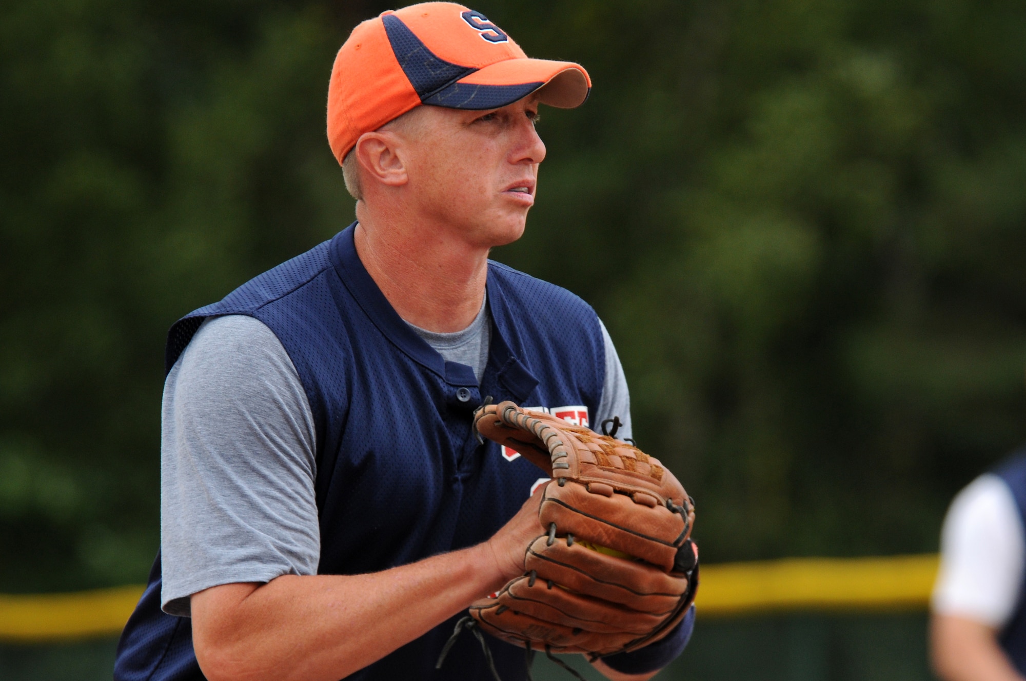 Master Sgt. Tom Bryns, USAFE A3, prepares to pitch during the United States Air Forces in Europe championship softball game Aug. 7, 2008, Ramstein Air Base, Germany. USAFE A3 went on to beat the GK Hitmen from Geilenkirchen, 22-11. (U.S. Air Force photo by Airman 1st Class Nathan Lipscomb)(Released)