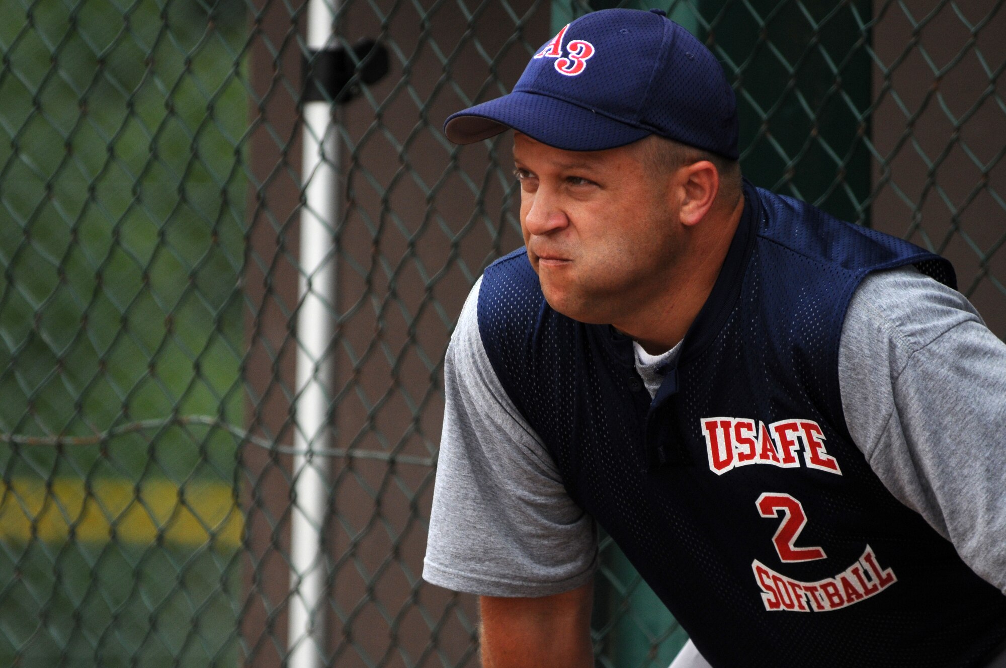 United States Maj. Douglas Leamon, USAFE A3, chews on sun flower seeds during the United States Air Forces in Europe championship softball game Aug. 7, 2008, Ramstein Air Base, Germany. USAFE A3 went on to beat the GK Hitmen from Geilenkirchen, 22-11. (U.S. Air Force photo by Airman 1st Class Nathan Lipscomb)(Released)