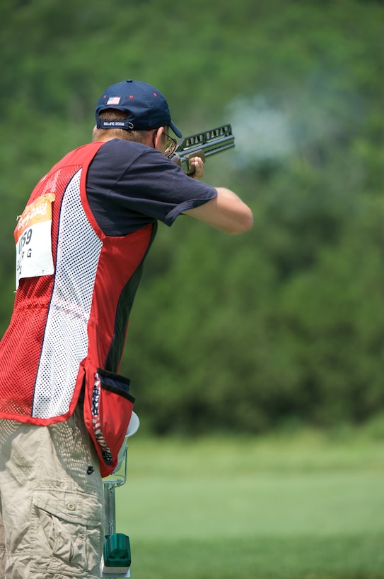 With this shotgun blast, Spc.
Walton Glenn Eller III of the U.S. Army Marksmanship Unit established an Olympic record of 145 in double trap qualifying Aug. 12, 2008, at the Beijing Shooting Range. Later in the day, he won the gold medal by completing the final with an Olympic record total of 190.
