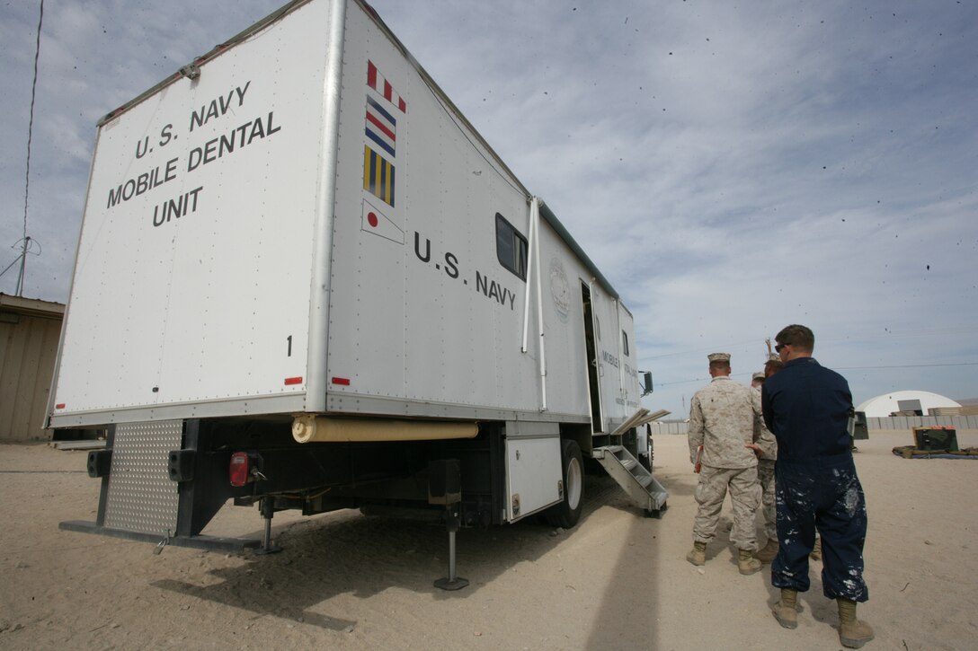 Marines participating in Mojave Viper, a pre-deployment training evolution, wait outside the 23rd Dental Company’s Mobile Dental Unit Aug. 13 at the Camp Wilson. The objective of the MDU is to return Marines and sailors at the Combat Center to their training as quickly as possible while providing them with the necessary dental care.