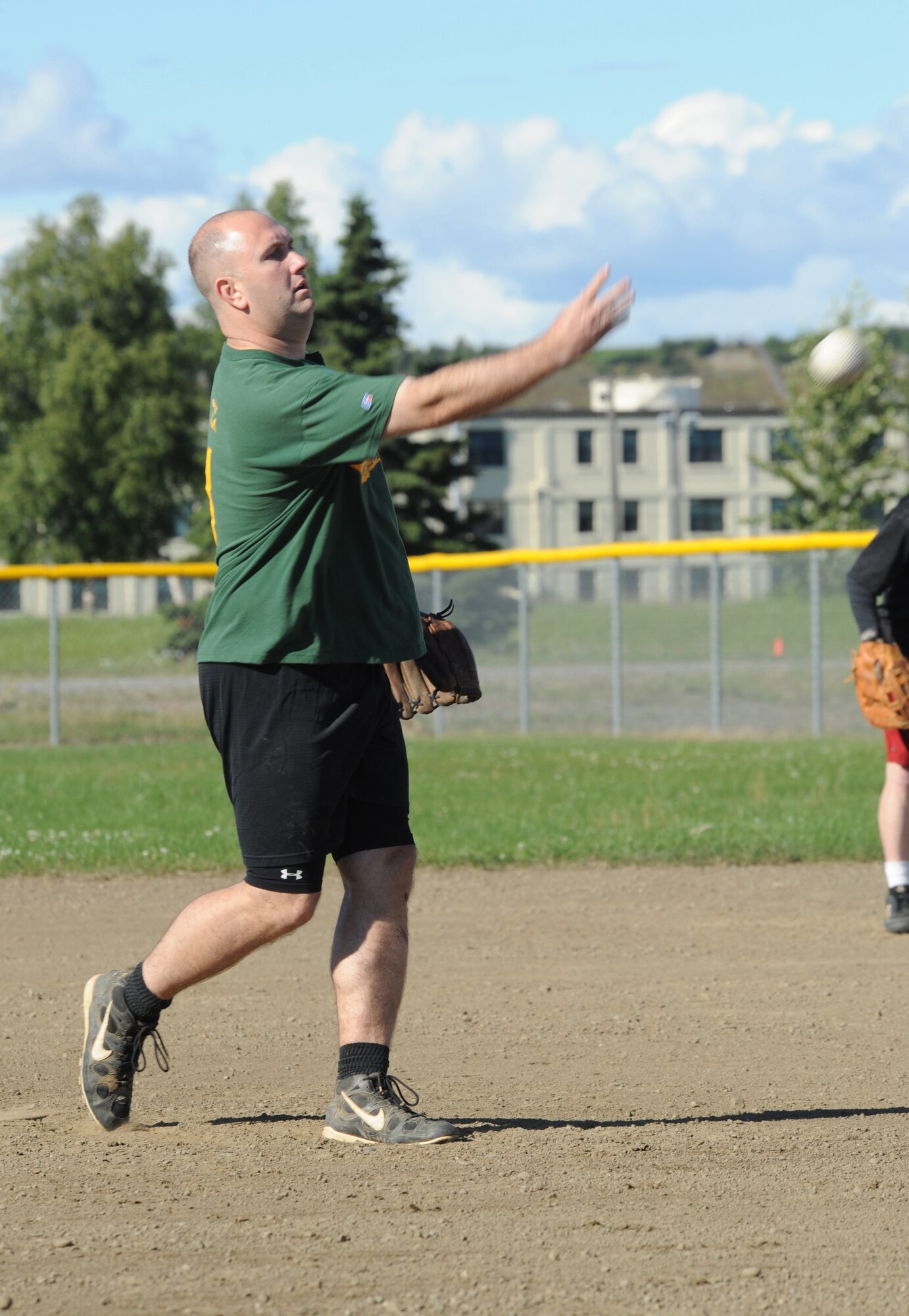 ELMENDORF AIR FORCE BASE, Alaska -- Jeremy Edwards, 381st Intelligence Squadron, pitches to a member of the 19th Fighter Squadron August 6.The 381st IS went head to head with the 19th Fighter Squadron Gamecocks in a bid for the Intramural Softball Championship game. The 381st IS won the championship game finishing the season with a record of 10-1. (U.S. Air Force photo/Airman 1st Class Matthew Owens)