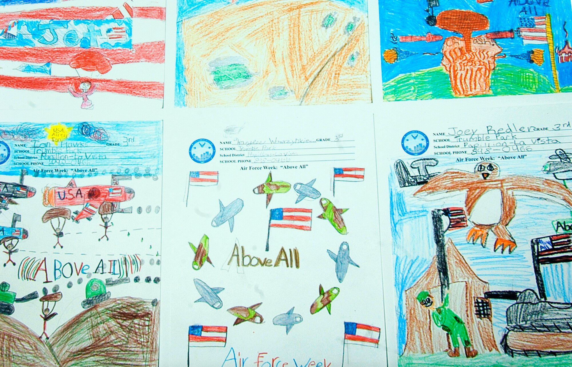 Elementary students from the local community display their submissions for a special Air Force Week design contest exhibited at Air Force Week in the Heartland Aug. 13 at the Strategic Air and Space Museum in Ashland, Neb. Museum officials hosted a day dedicated to the legacy of airpower providing special Air Force demonstration teams and displays. (U.S. Air Force photo/Staff Sgt. Bennie J. Davis III)