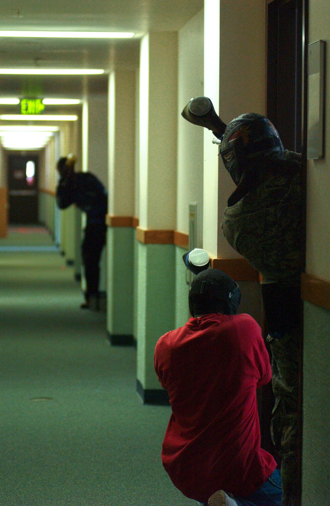 ELMENDORF AIR FORCE BASE, Alaska -- Airmen face off in the hallways of the Knik Dorms. More than 25 Airmen participated in the tournament. Airmen participating in the event were members of Airmen Committed to Excellence. Knik Hall is set to be demolished Aug. 18. (U.S. Air Force photo/Airman 1st Class Kristin High)