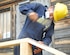 SOTO CANO AIR BASE, Honduras - A contractor builds a new set of stairs for a building at Joint Task Force-Bravo. Because JTF-Bravo is a temporary installation most of the buildings are made out of wood. Termites and weather conditions require the civil engineers to consistently replace the wood on the structures. (U.S. Air Force photo by Staff Sgt. Joel Mease)