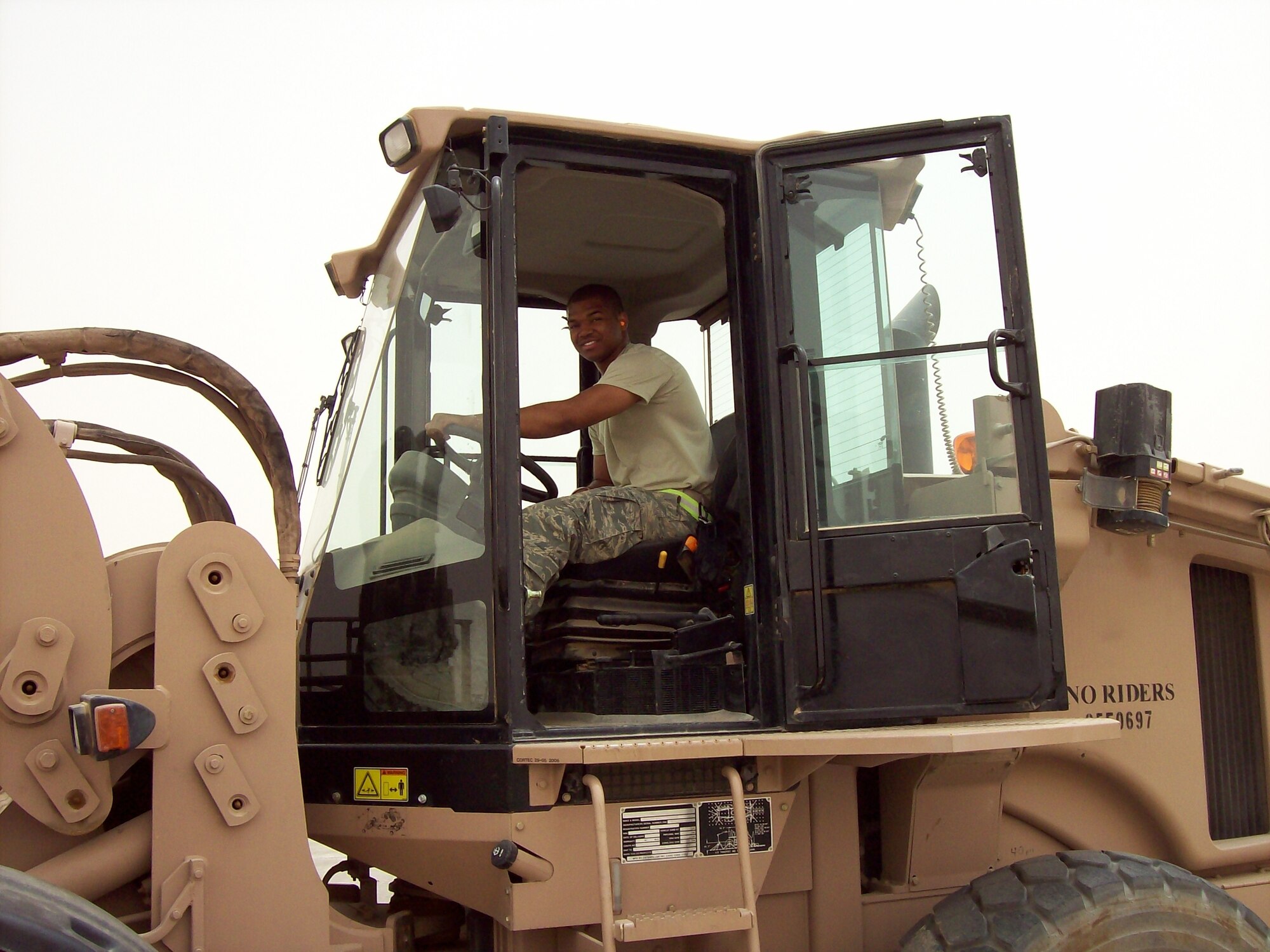 IRAQ – Senior Airman Ronald Rowe, 62nd Aerial Port Squadron, drives a K-loader during a recent deployment. (Courtesy photo.)