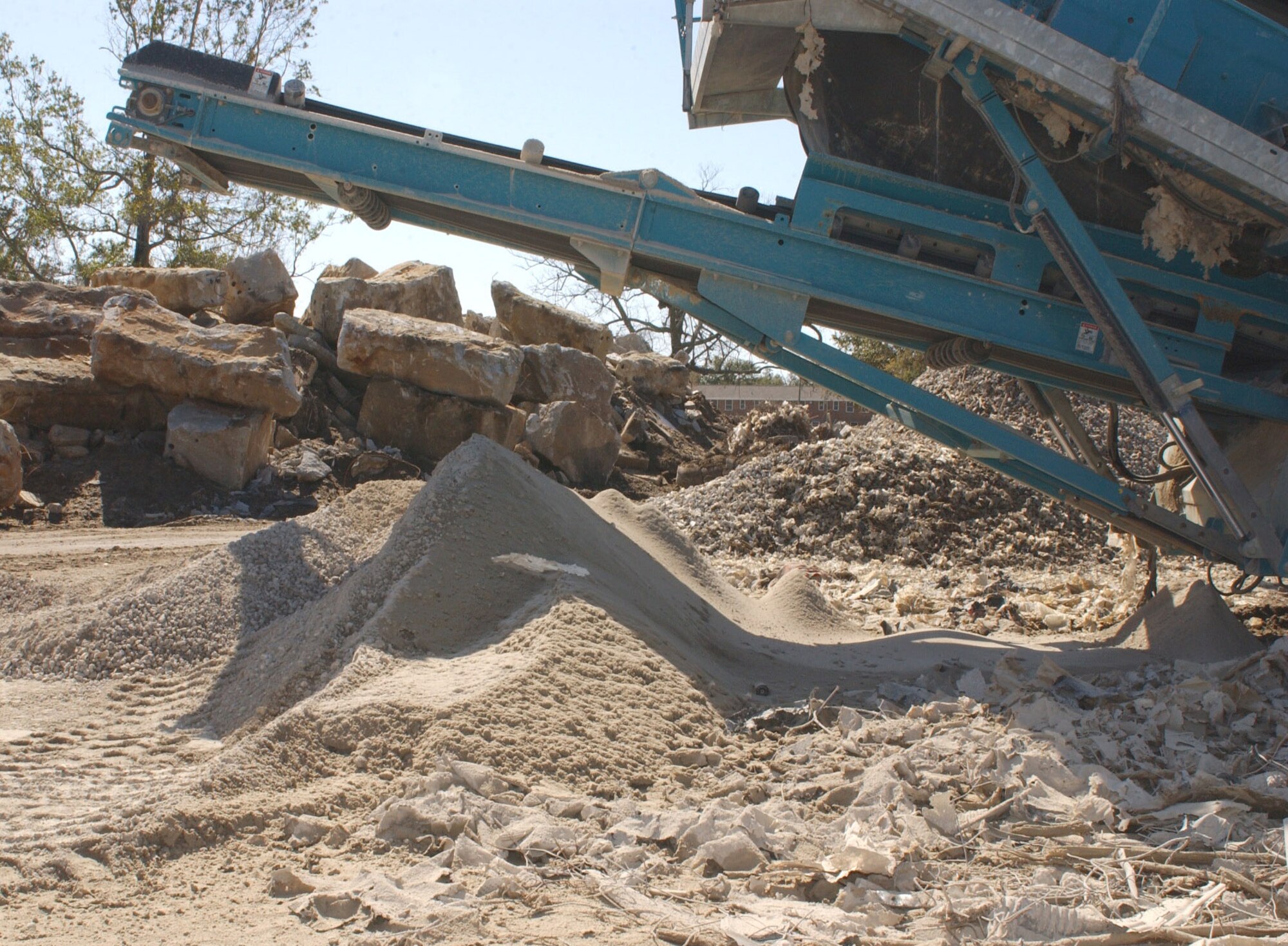 Concrete is processed at the former Harrison Court military housing area east of the base.  (U.S. Air Force photo by Kemberly Groue)