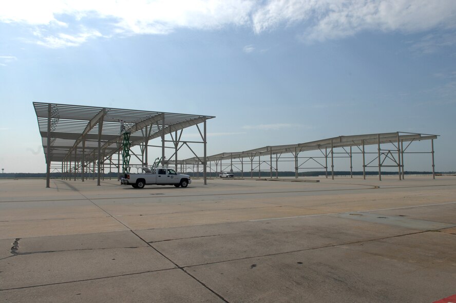 SHAW AIR FORCE BASE, S.C. -- Iron workers with Agate Construction from Mason, Ariz., construct multi-million dollar aircraft shelters to improve flightline Airmen's safety, well-being and job environment along with providing aircraft protection from weather elements, Aug. 7. The shelters are scheduled for completion in February 2009. (U.S. Air Force photo/Staff Sgt. Nathan Bevier)