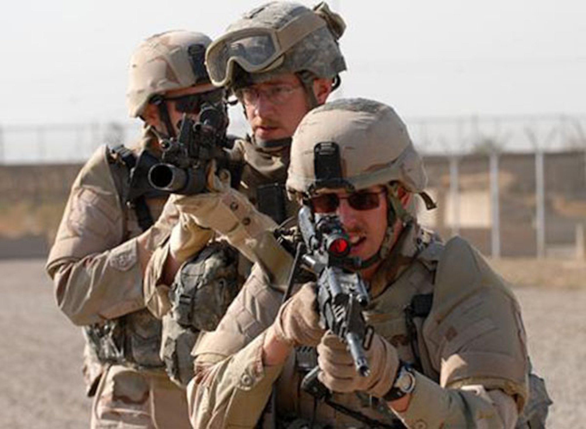 Staff Sgt. Michael Rodden, 741st Missile Security Forces Squadron, and two of his squad mates conduct battle drills before going into Baghdad. (Courtesy photo)