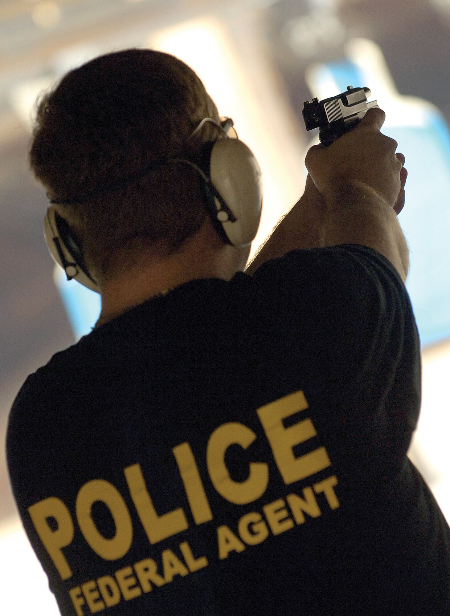 Tinker’s Air Force Office of Special Investigation – Detachment 14 agent Dave Crawford competes against other federal law enforcement personnel during the 11th annual shooting competition held here Aug. 8. The OSI-sponsored event draws competitors from all federal law enforcement agencies including the Postal Service, Secret Service, FBI, Bureau of Indian Affairs and Tinker’s own 72nd Security Forces Squadron.(Air Force photo/Margo Wright)