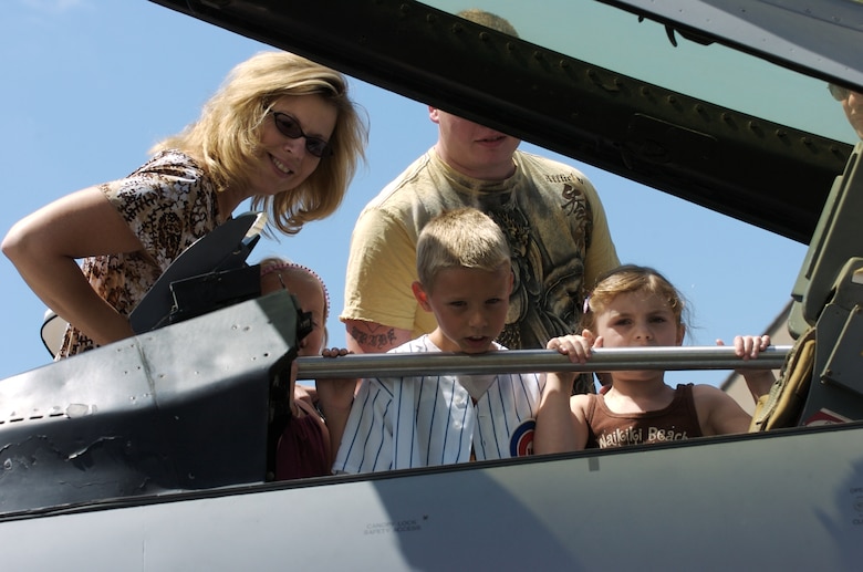 Becky (left), Jenna, Jack, Kyle (yellow shirt) and Kyrah Krenke-Dailey get an up-close view of an F-16 Fighting Falcon during Air Force Week in the Heartland Aug. 12 at the Henry Doorly Zoo in Omaha, Neb. Zoo visitors also had the chance to see the Do Something Amazing display, a motion simulator and video simulators during Air Force Week in the Heartland. (U.S. Air Force photo/Lance Cheung)