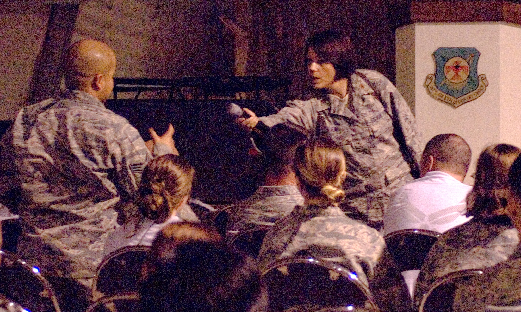 ALI BASE, Iraq -- Maj. Laura Lien, 732nd Expeditionary Support Squadron Combat Stress Control, interacts with a professional development seminar attendee Aug. 9, 2008. Major Lien facilitated the "One-Shot/One-Kill" discussion during the two-hour session. (U.S. Air Force photo/Tech. Sgt. Francesca Popp)