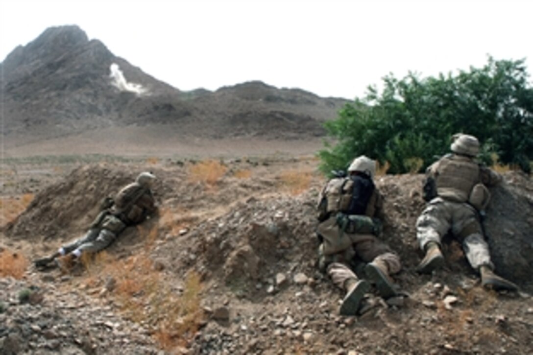U.S. Marines return fire after being fired upon by members of the Taliban during a mounted patrol outside a forward operating base in the Farah province of Afghanistan, Aug. 2, 2008. The Marines are assigned to Golf Company, 2nd Battalion, 7th Marine Regiment. 