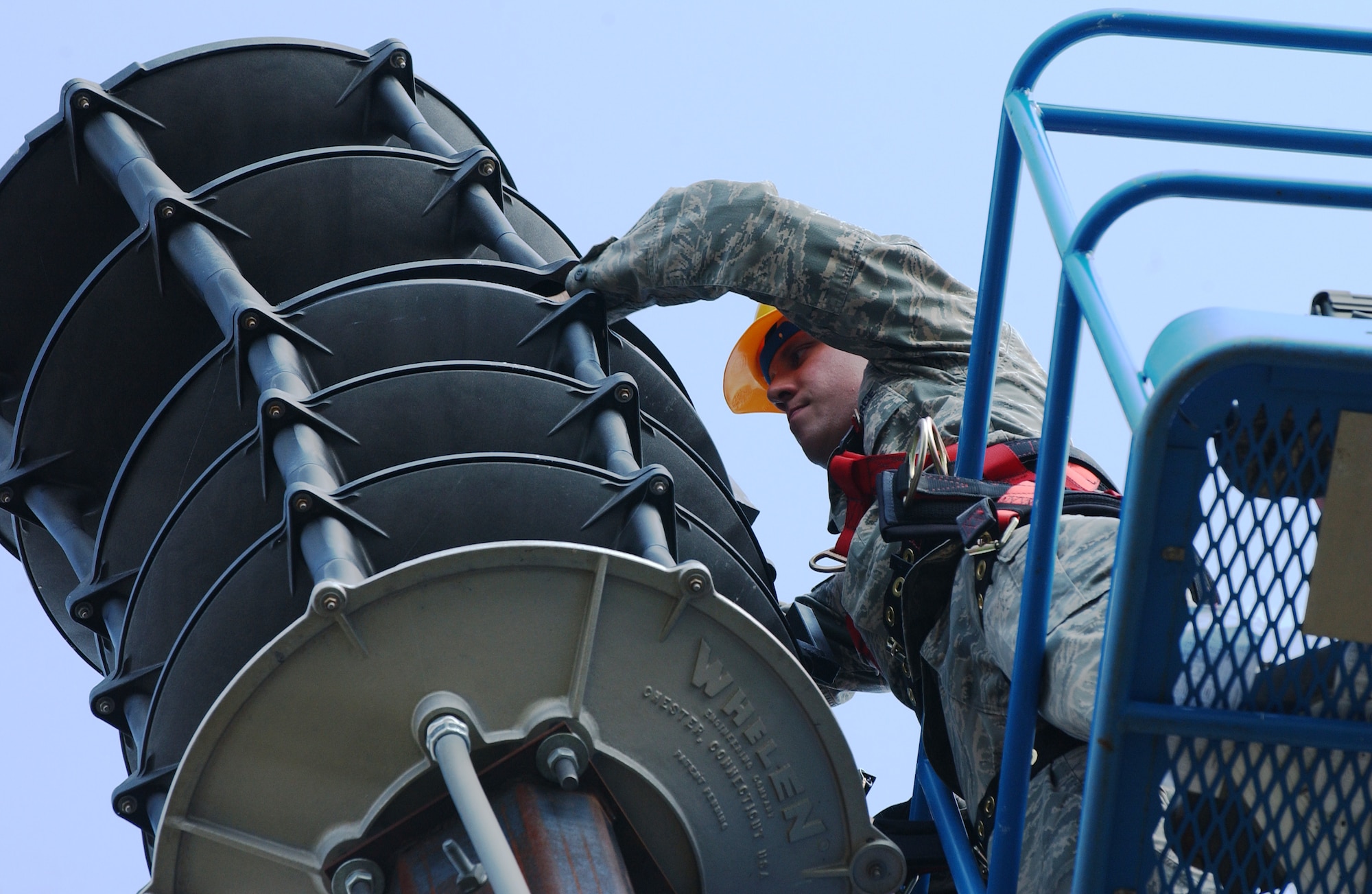 Senior Airman Lance Egan opens the stacks on a giant voice system to replace a blown speaker Aug. 13, 2008, at Eielson Air Force Base, Alaska. The speaker was only producing 4/5 the normal power, hindering the range it can be heard from. The radio maintenance shop conducts preventive maintenance inspections on every giant voice system to ensure it works properly when needed to inform base populace. He is assigned to the 354th Communication Squadron.  (U.S. Air Force photo by Airman 1st Class Jonathan Snyder)