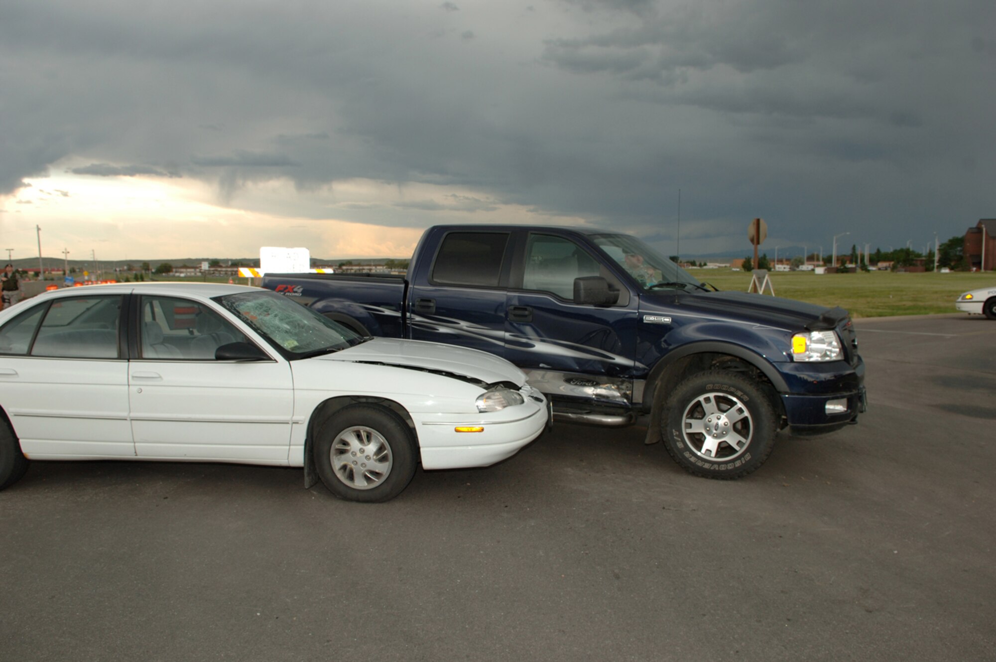 Members of the 28th Security Forces Squadron responded to a vehicular accident at the intersection of LeMay Boulevard and Lincoln Drive here, Aug. 13. The 28th Bomb Wing Safety Office reminds Ellsworth drivers to be cautious of distractions while driving in order to prevent occurrences such as this in the future. The accident is currently under investigation. (U.S. Air Force photo by/Senior Airman Kasey Zickmund)