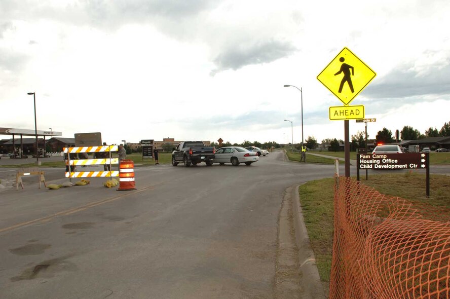 Members of the 28th Security Forces Squadron responded to a vehicular accident at the intersection of LeMay Boulevard and Lincoln Drive here, Aug. 13. The 28th Bomb Wing Safety Office reminds Ellsworth drivers to be cautious of distractions while driving in order to prevent occurrences such as this in the future. The accident is currently under investigation. (U.S. Air Force photo by/Senior Airman Kasey Zickmund)