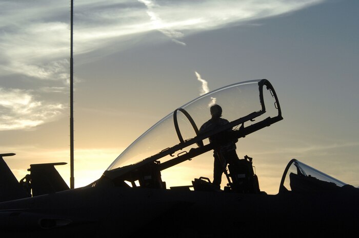 A member of the Republic of Korea Air Force conducts post-flight maintenance on a F-15K Slam Eagle following a Red Flag mission at Nellis Air Force Base, Nev., Aug. 13, 2008. ROKAF aircraft and crews are participating in their first Red Flag exercise. Red Flag provides a peacetime "battlefield" within which U.S. and allied aircrews train to fight, survive and win. (U.S. Air Force photo by: Airman 1st Class Ryan Whitney) 
