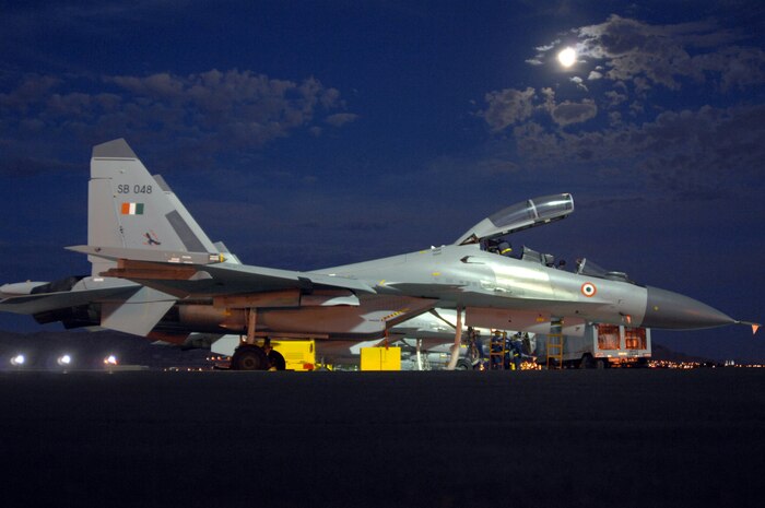 Aircraft maintainers with the Indian air force conduct post-flight maintenance on an SU-30 Fighter following a Red Flag mission at Nellis Air Force Base, Nev. Aug. 13 2008. The Indian air force is at Nellis for Red Flag 08-4, a two-week exercise that pits forces in a realistic aerial "battlefield" to hone the fighting skills of American and allied airmen. Republic of Korea, Indian, Navy and Air Force teams are joining the Indian air force in Red Flag 08-4.(U.S. Air Force photo by Airman 1st Class Ryan Whitney)