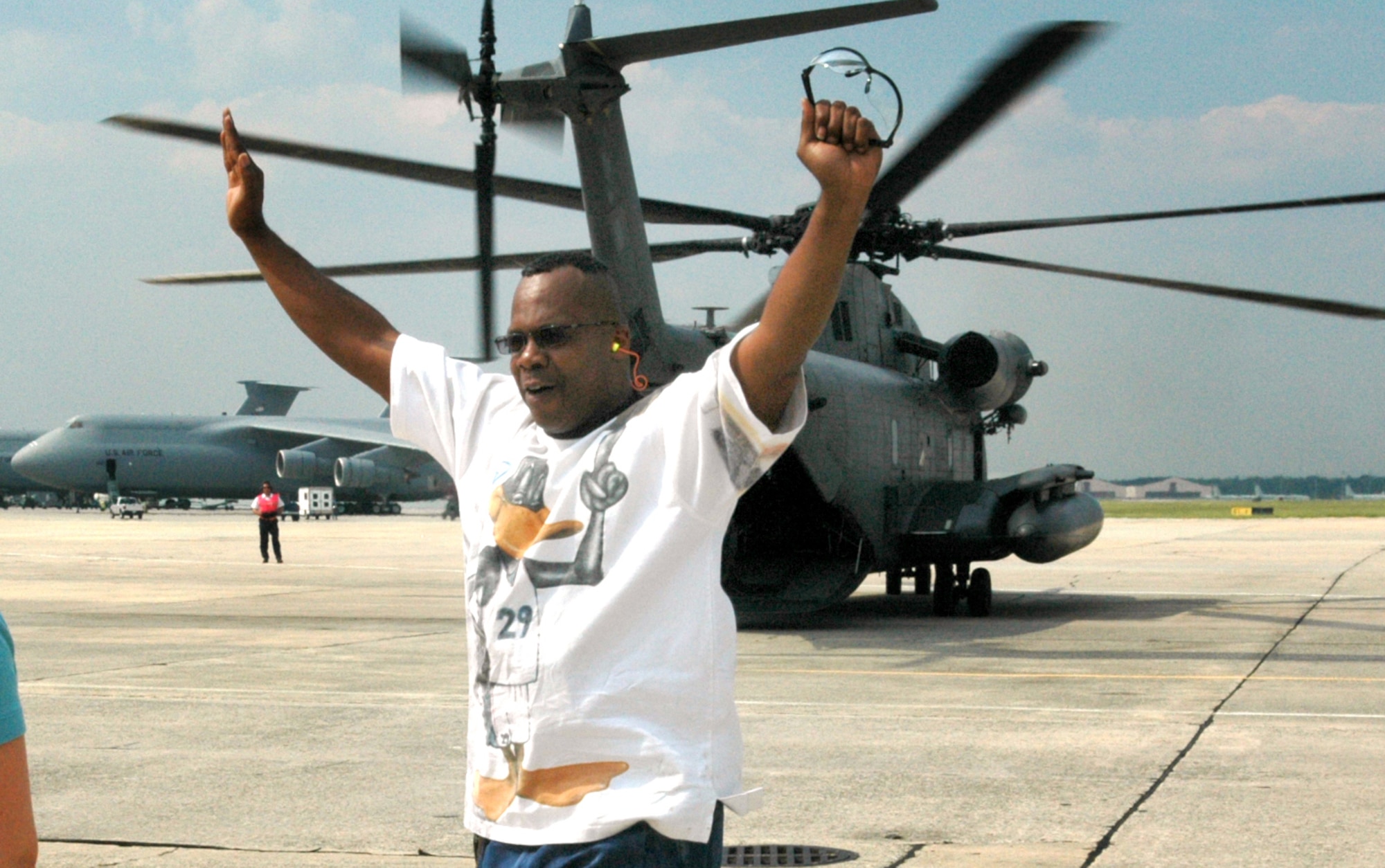 James Davis came off the incentive flight with his arms in the air. “It was great, outstanding, spectacular. It shook me up. It gave me a greater appreciation for what they (the troops) do and how we support them.” U. S. Air Force photo by Sue Sapp