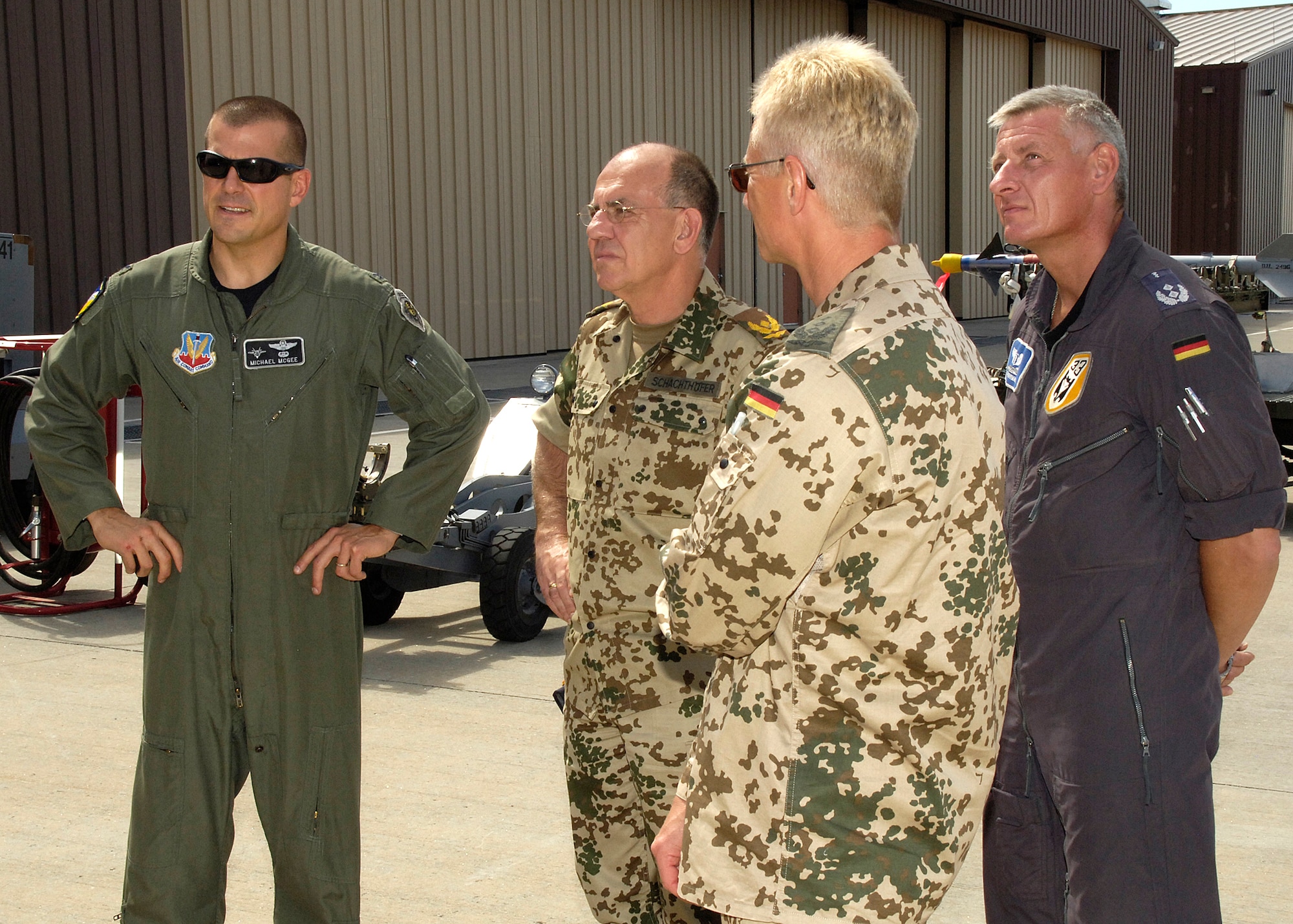 Col. Michael McGee, 49th Fighter Wing vice commander, givea a tour of an F-22A Raptor to Brig. Gen. Gero L.K. Schachthöfer, German Air Force commander German Armed Forces Command United States and Canada, Col. Peter Klement, German Air Force Flying Training Center commander, and Lt. Col. Udo Herrmann, German Air Force, August 13, at Holloman Air Force Base, N.M. General Schachthöfer was visiting Holloman to present the Flight Safety Award to the German Air Force Flying Training Center for having no flight accidents from January 2002 to December 2007. (U.S. Air Force photo/Airman 1st Class Michael Means)