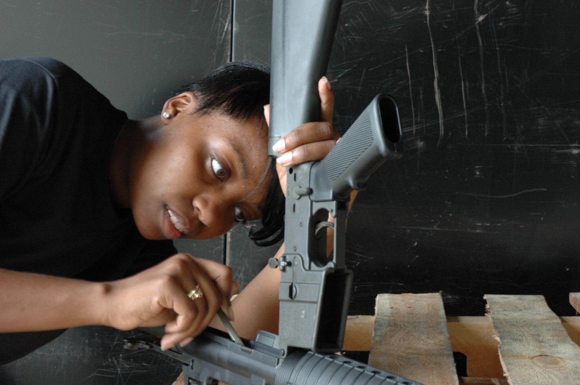 MCGUIRE AIR FORCE BASE, N.J. -- Airman 1st Class Tanile Burns is one of a handful of Air Force Reserve volunteers who recently cleaned close to a thousand weapons within one week. The mass cleaning was in part due to an annual requirement as well as partly due to preparation for an upcoming operational readiness inspection. (U.S. Air Force photo/Senior Airman William P. O'Neil, III) 
