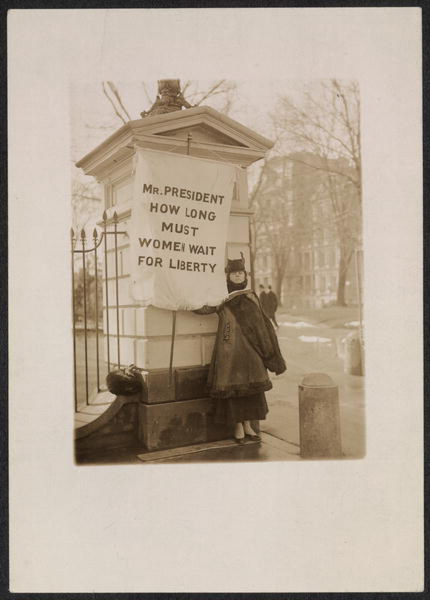 Women suffragettes picketed the White House in 1917 to get the attention of President Woodrow Wilson and his support for a Suffrage Amendment.