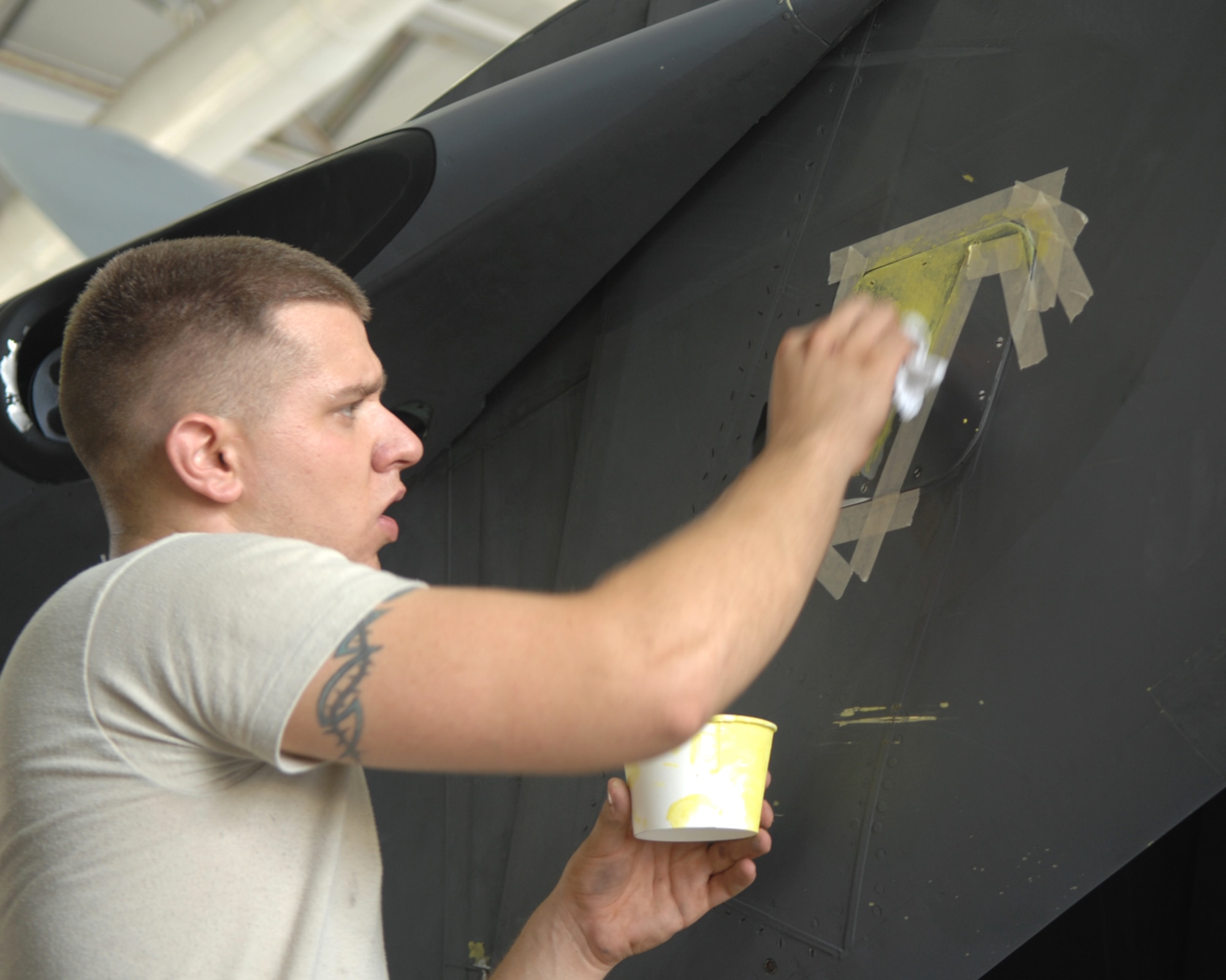 ANDERSEN AIR FORCE BASE, Guam - Airman 1st Class Jake Sides, 389th Expeditionary Aircraft Maintenance Squadron, performs maintenance on an F-15E Strike Eagle during its phase maintenance Aug. 14. A phase inspection is a group of maintenance squadron flights working together towards a common goal, which is the completion of the inspection, a phase inspection is a miniature overhaul for the aircraft that is performed every 400 flight hours. (U.S. Air Force photo by Airman 1st Class Cory Todd)
