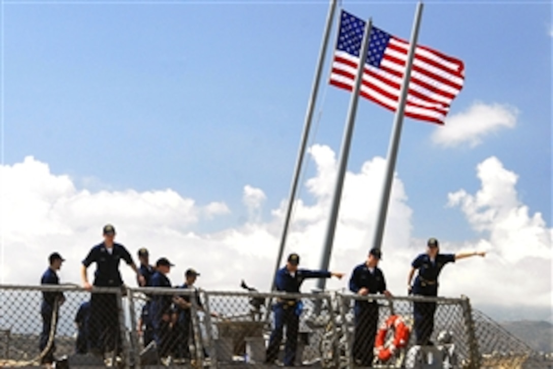 U.S. Navy sailors conduct mooring operations as the guided-missile destroyer USS McFaul arrives for a routine port visit to Souda Bay, Crete, Aug. 11, 2008. The USS McFaul is in the U.S. 6th Fleet area of responsibility to support theater security, participate in regional exercises with allies, make diplomatic port calls and respond to any contingency. 