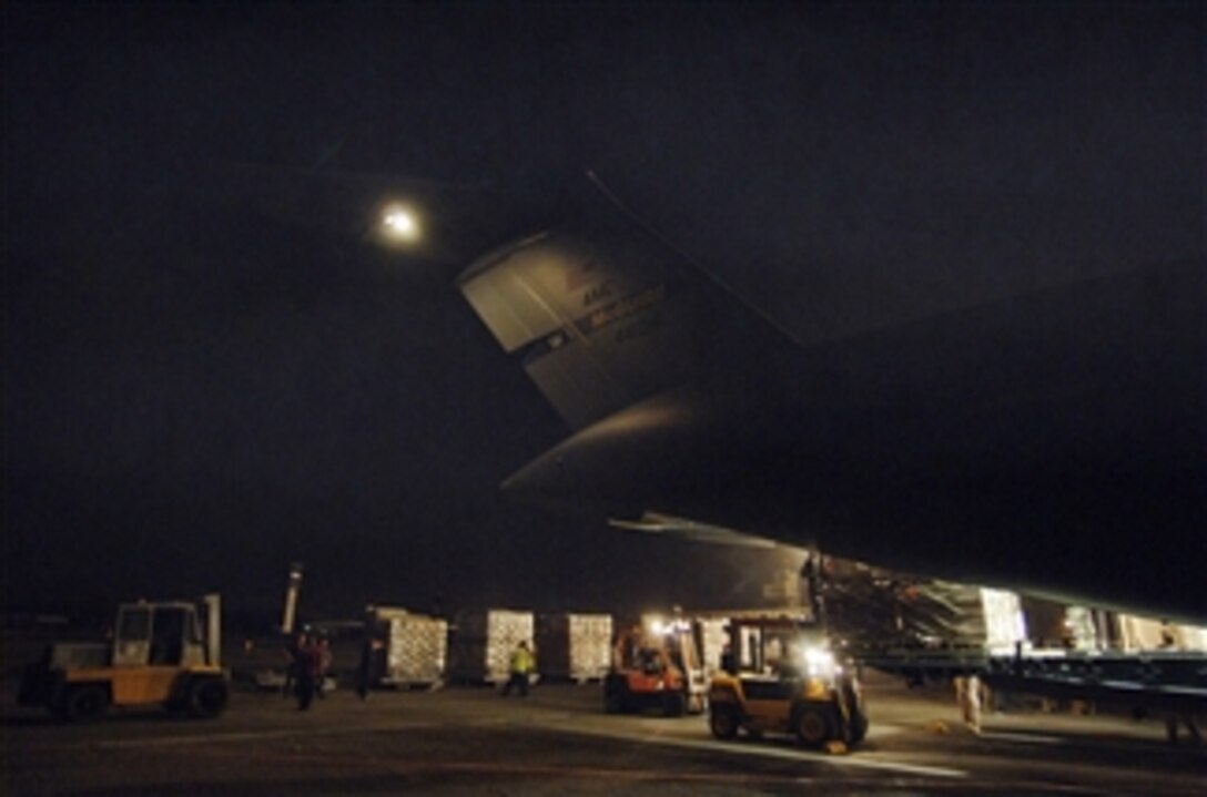 A C-17 Globemaster III aircraft delivers the first load of humanitarian aid to Tbilisi, Georgia, from Ramstein Air Base, Germany, on Aug. 13, 2008.  U.S. airmen and soldiers worked 36 hours to palletize and deliver more than 75,000 pounds of emergency shelter items and medical supplies.  