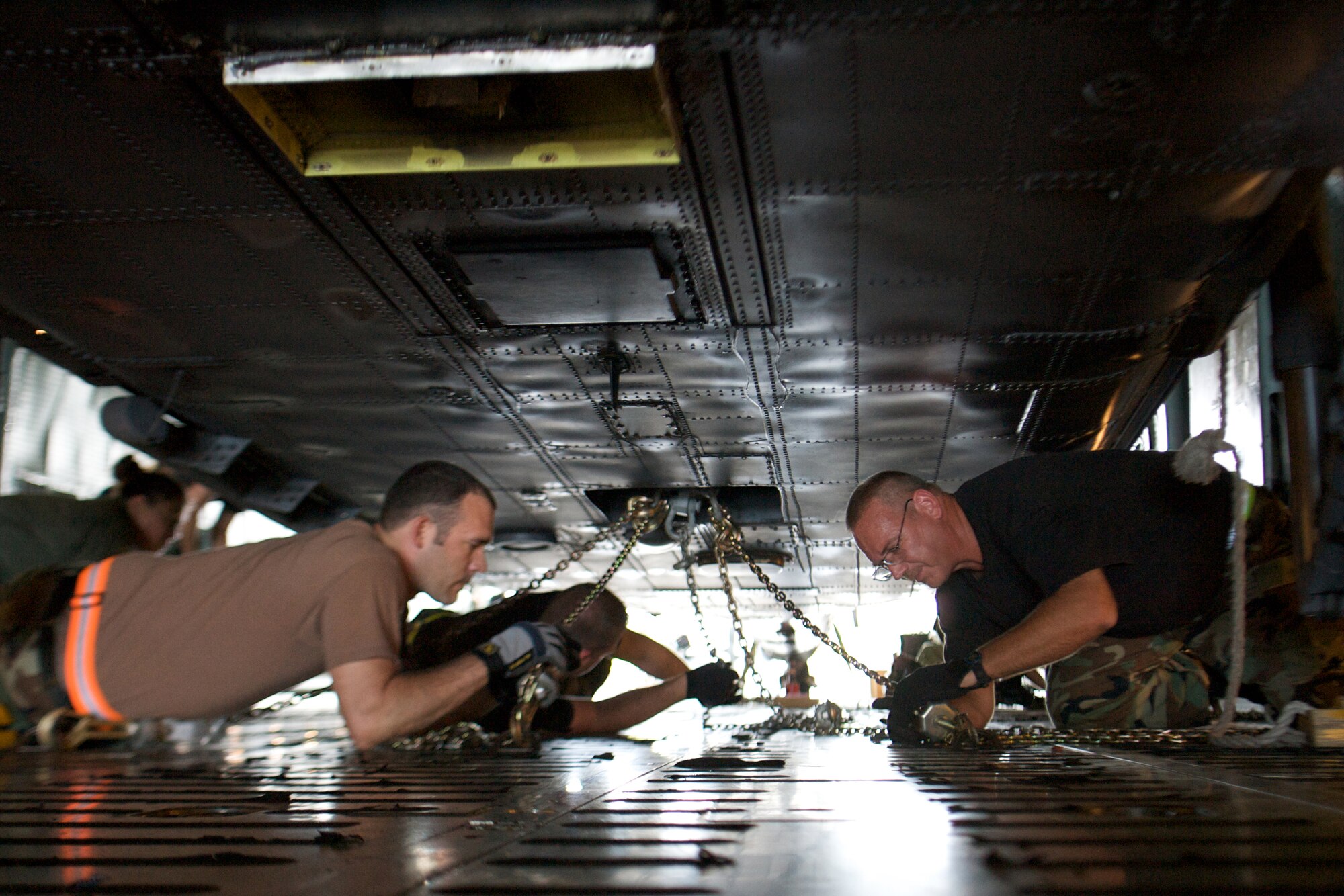 CAPE CANAVERAL AIR FORCE STATION, Fla. -- Air Force Reservists from the 920th Rescue Wing at Patrick Air Force Base, Fla., load two HH-60G Pave Hawk helicopters onto a C-5 Galaxy that will airlift the helicopters overseas for life saving operations as the 920th helicopter, maintenance and support personnel prepare to mobilize in support the Global War on Terrorism.  (U.S. Air Force Photo/Tech. Sgt. Jeremy Allen)