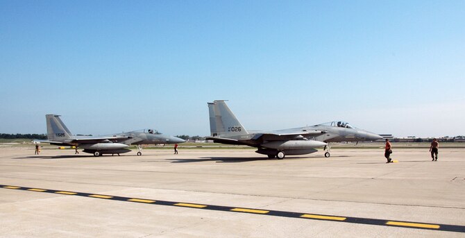 F-15C FAREWELL - Aircraft AF 78-525 and AF 82-011 depart from the Missouri Air National Guard Base at Lambert-Saint Louis toward their new home at  Great Falls ANG Base, Montana.  (Air Force Photo by MSgt Mary-Dale Amison.   RELEASED) 